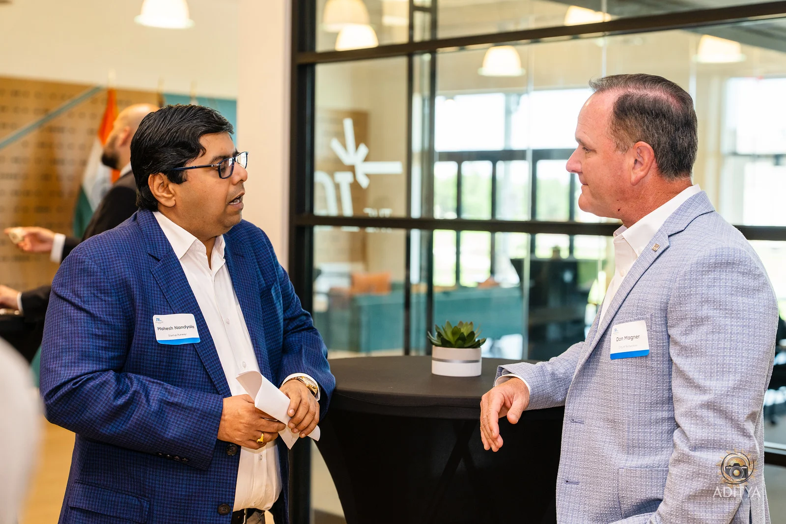 Startup Runway leadership speaking with an executive at Richardson IQ