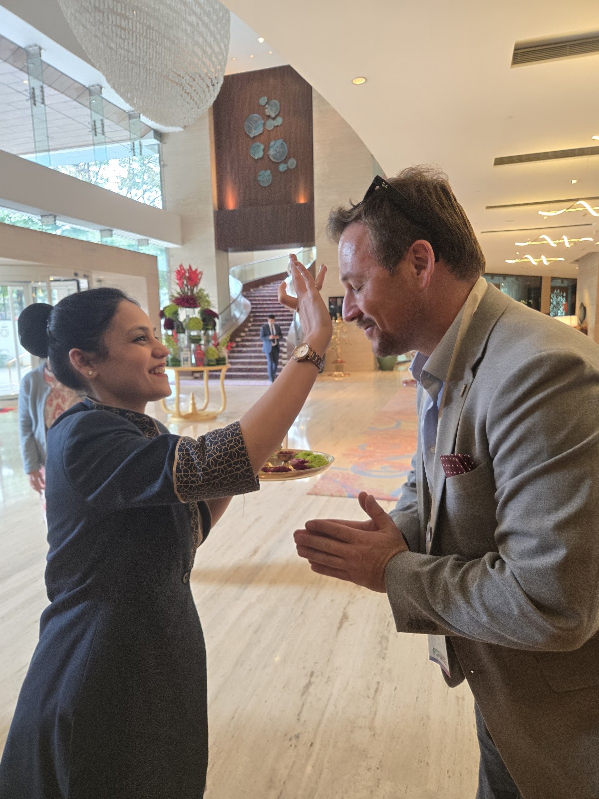 Mission participant welcomed at a Bengaluru program venue
