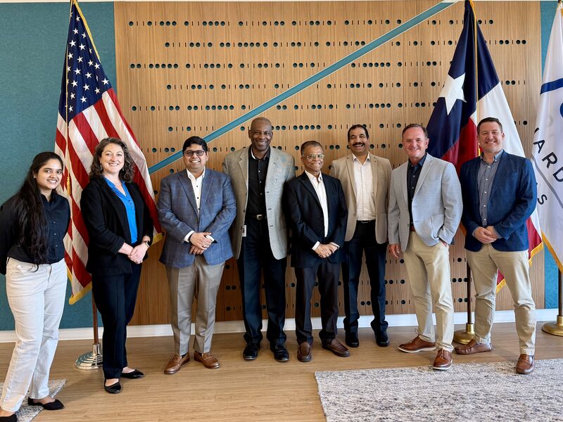 City, company, and Startup Runway representatives between United States, Texas, and Richardson flags at Richardson IQ